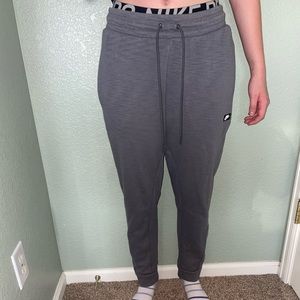 Women’s grey Nike sweat pants